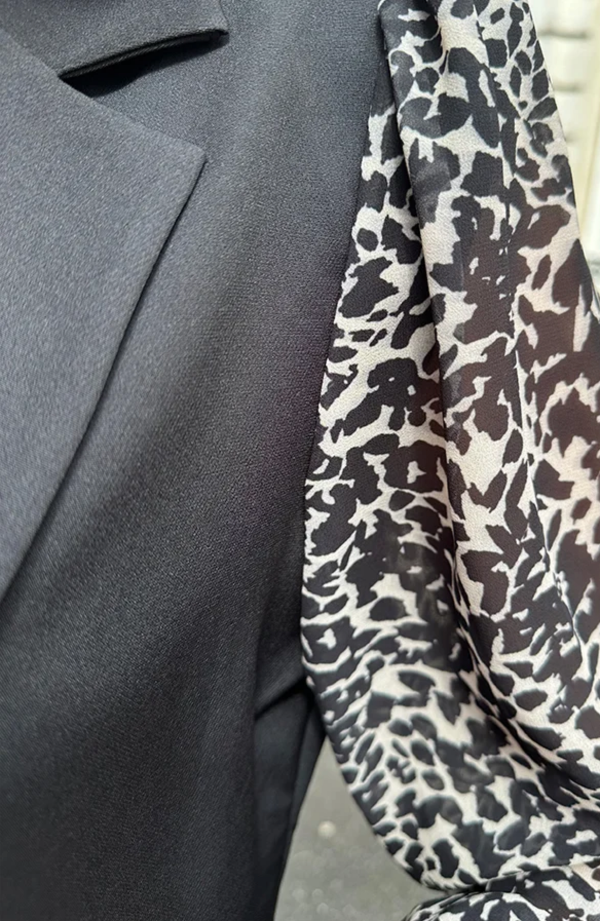 Elegant Black Blazer with Leopard Print Sleeves